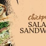 A graphic banner with a beige background. The right side has brown text that reads "chickpea SALAD SANDWICH." The left side shows a cross-section of a large, generously filled sandwich.