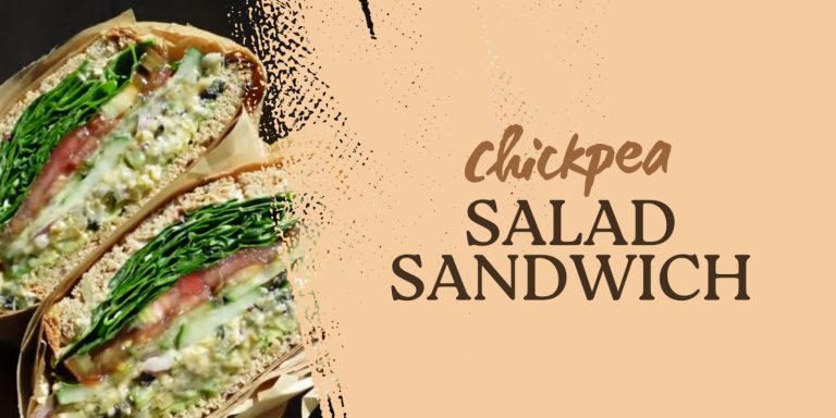 A graphic banner with a beige background. The right side has brown text that reads "chickpea SALAD SANDWICH." The left side shows a cross-section of a large, generously filled sandwich.