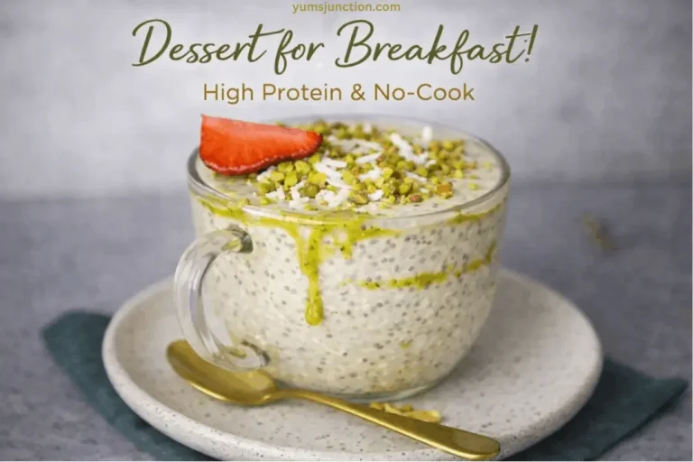 A promotional graphic for a "Dessert for Breakfast!" recipe. It shows the same mug of chia seed pudding, now with a green pistachio sauce artistically dripping down the outside of the glass. Text at the top reads "yumsjunction.com," "Dessert for Breakfast!", and "High Protein & No-Cook."