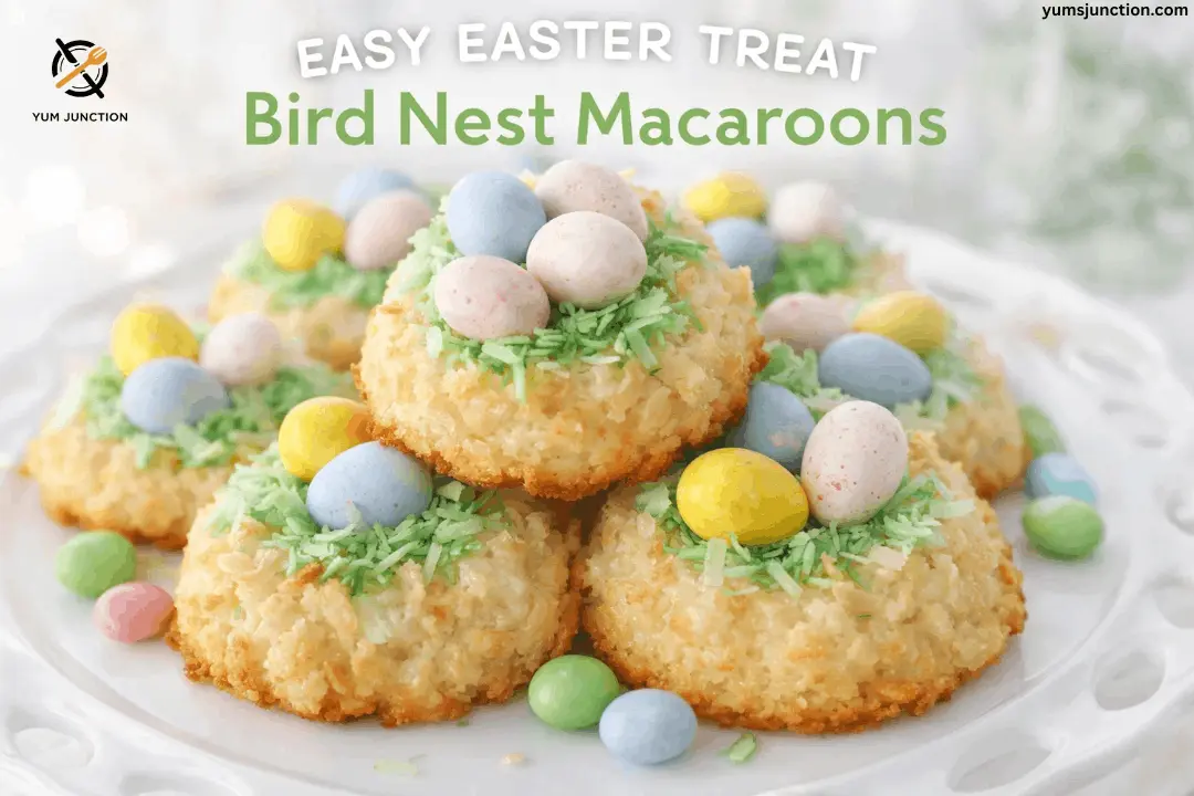A promotional graphic for "Bird Nest Macaroons" featuring a stack of golden coconut macaroons on a white plate. Each macaroon is decorated with green-tinted coconut shreds in the center to resemble a nest and is topped with three pastel candy eggs in blue, yellow, and pink. Text at the top reads "EASY EASTER TREAT" and "Bird Nest Macaroons," with the Yum Junction logo in the corner.