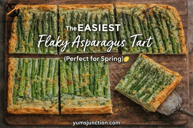 A horizontal promotional graphic titled "The EASIEST Flaky Asparagus Tart (Perfect for Spring)." The image shows slices of the golden, crispy tart on a dark wooden cutting board scattered with lemon zest. A vintage silver server is lifting one slice. Includes the Yum Junction logo and website URL.
