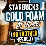 A Yum Junction promotional graphic with the text "Starbucks Cold Foam at Home! (No Frother Needed)". The image shows thick white foam being poured from a jar into iced coffee, next to a silver cocktail shaker and vanilla beans.