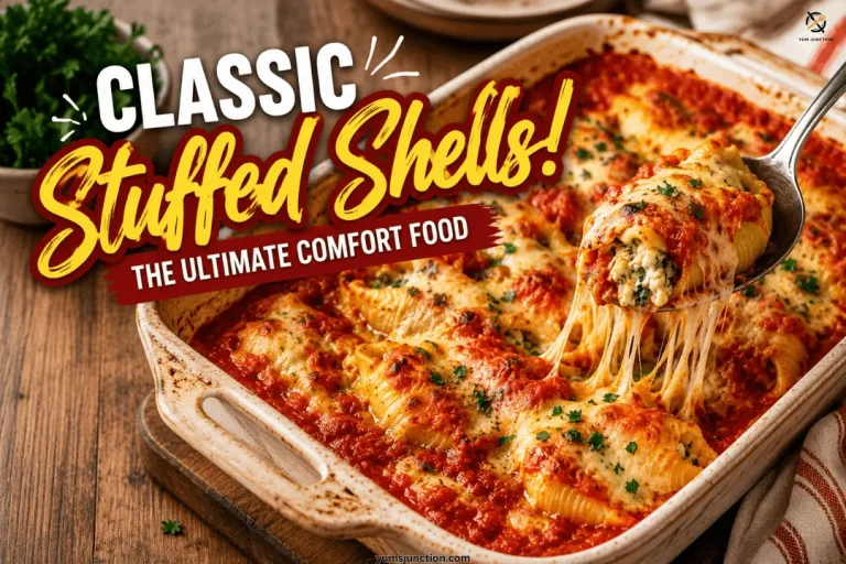 Baked stuffed shells in a casserole dish with golden melted cheese and marinara, a spoon lifting one shell with a dramatic mozzarella pull